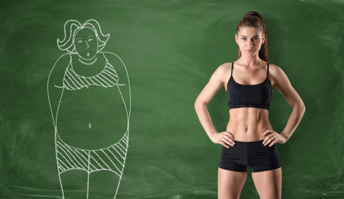 Woman deciding how long she should exercise for weight loss