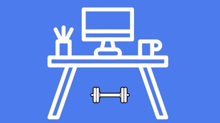 desk with barbell under it for exercising