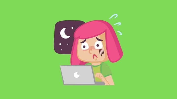 woman at computer displaying symptoms of a panic attack icon
